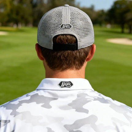 The Imperial Dyno Laser Perforated Hat, featuring the 1i Golf insignia logo.