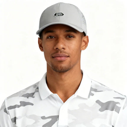 The Imperial Alpha Laser-Perforated Performance Hat Adorned With 1i Golf’s 1iside logo.